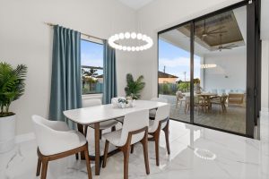 Modern kitchen featuring glass folding patio doors