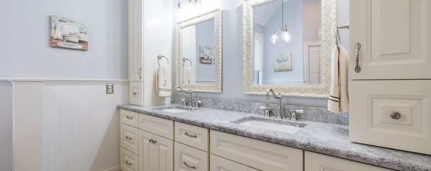 A clear bathroom vanity materials comparison covering cabinet construction and countertop options — durability, cost, and best use cases.