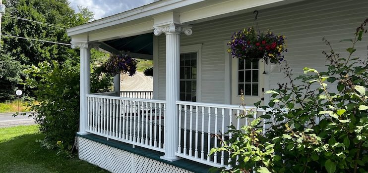 Compare front porch railing ideas &mdash; wood, composite, metal, and cable &mdash; that fit New England homes and stand up to all four seasons.