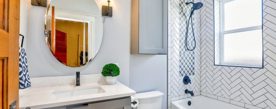 Small bathroom layout ideas that make older New England bathrooms feel bigger — without moving plumbing. Smart fixtures, doors, and storage.